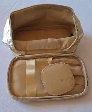 Pochette oro effetto trapuntato