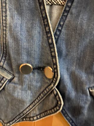 Chaleco vaquero XS con detalles plateados