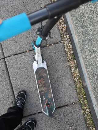 Patín Oxelo blanco y azul