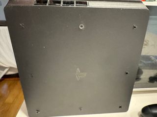 PS4 Slim 500GB Negra + FC 24 + 2 mandos + palancas