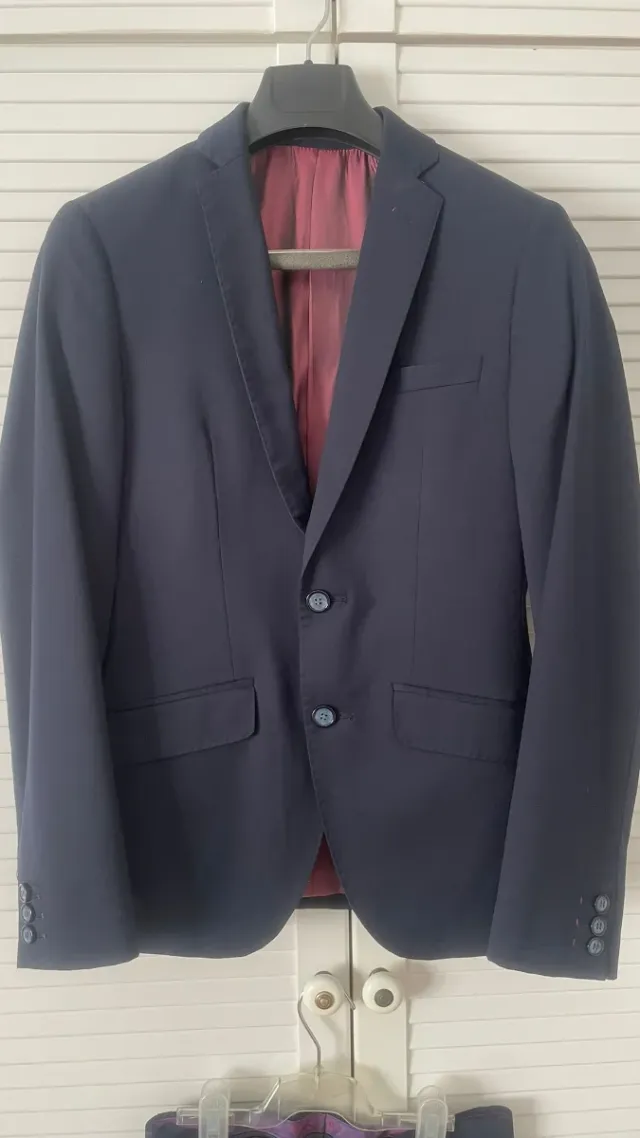 Traje de chaqueta y pantalón azul marino