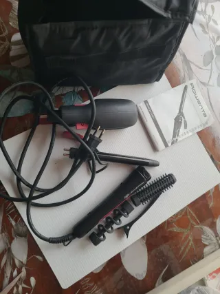 Plancha y rizador  de pelo Rowenta negra