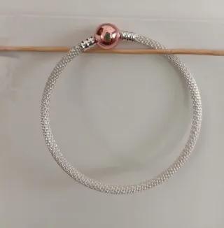 Pulsera rígida cordón oro y plata