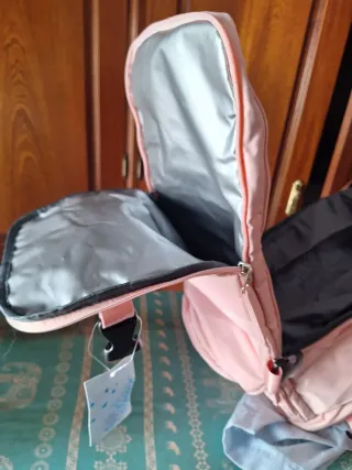 Mochila de viaje rosa sin estrenar