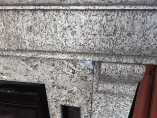 Regalo frente de Chimenea de granito con pellets