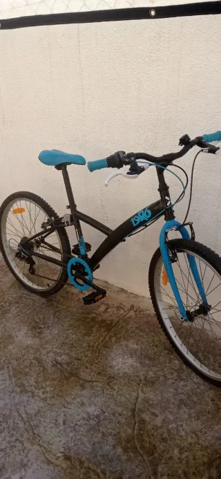 Bicicleta juvenil 26 azul y negra