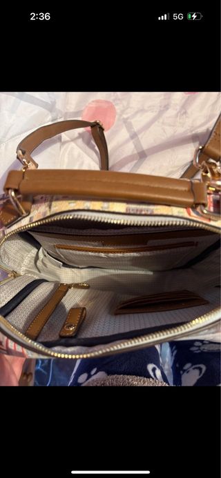 Mochila portátil y monedero a juego