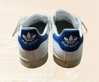 White and blue Adidas Stan Smith lace up sneakers