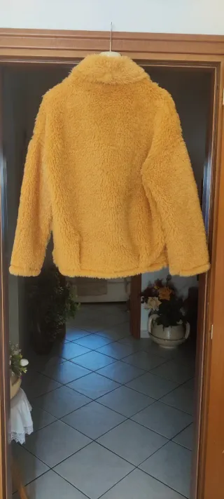 Pellicciotto ecologico reversibile unisex