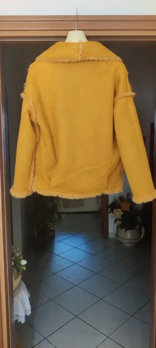 Pellicciotto ecologico reversibile unisex