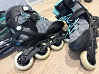 Patines Oxelo T. 38 con protectores y bolsa.