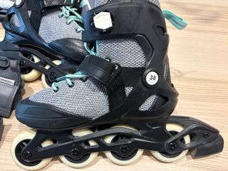 Patines Oxelo T. 38 con protectores y bolsa.