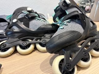 Patines Oxelo T. 38 con protectores y bolsa.