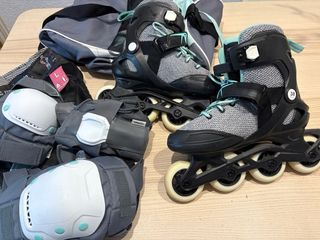 Patines Oxelo T. 38 con protectores y bolsa.