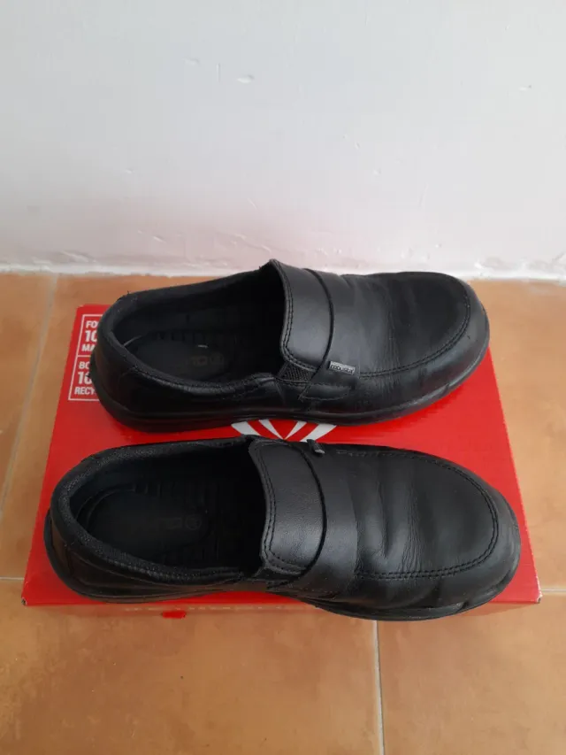 Zapatos de trabajo negros Unisex.