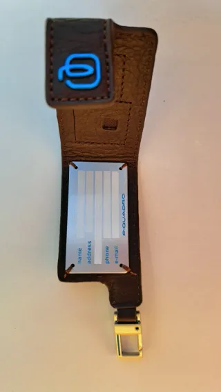 Etichetta bagaglio Piquadro in pelle