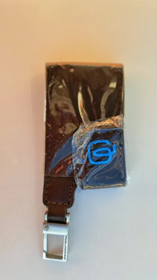 Etichetta bagaglio Piquadro in pelle