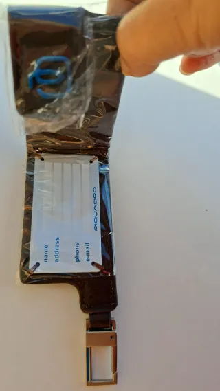 Etichetta bagaglio Piquadro in pelle