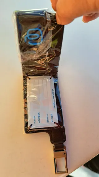 Etichetta bagaglio Piquadro in pelle