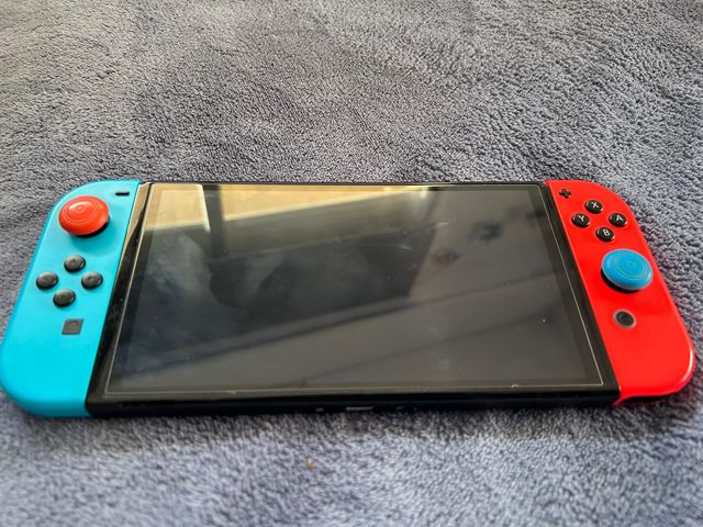 Nintendo Switch OLED + Dock, Cargador y Funda