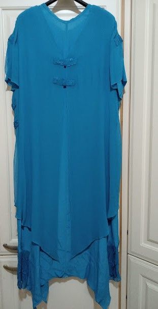 Abito elegante con decorazioni