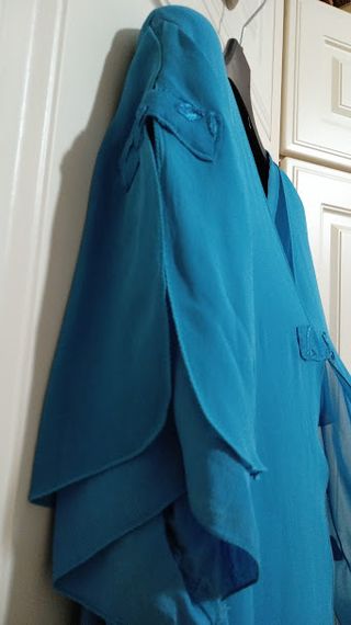 Abito elegante con decorazioni