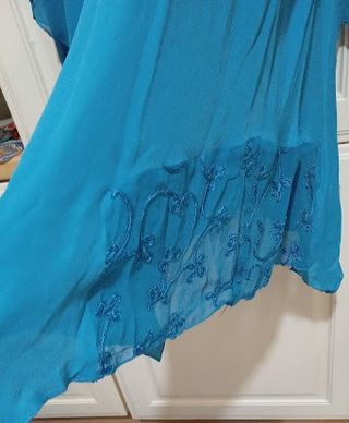 Abito elegante con decorazioni