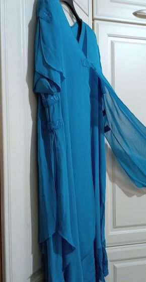 Abito elegante con decorazioni