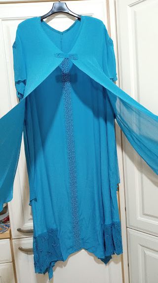 Abito elegante con decorazioni