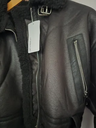 Giacchetto corto nero con pelliccia