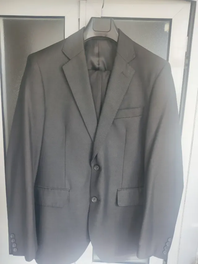 Traje gris oscuro talla 52