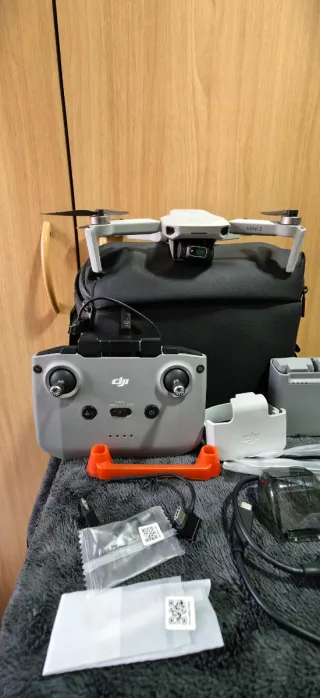 Drone Mini 2 + combo vuela más. (Poco uso)