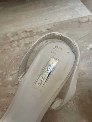 Sandalias de fiesta usadas en una ocasión