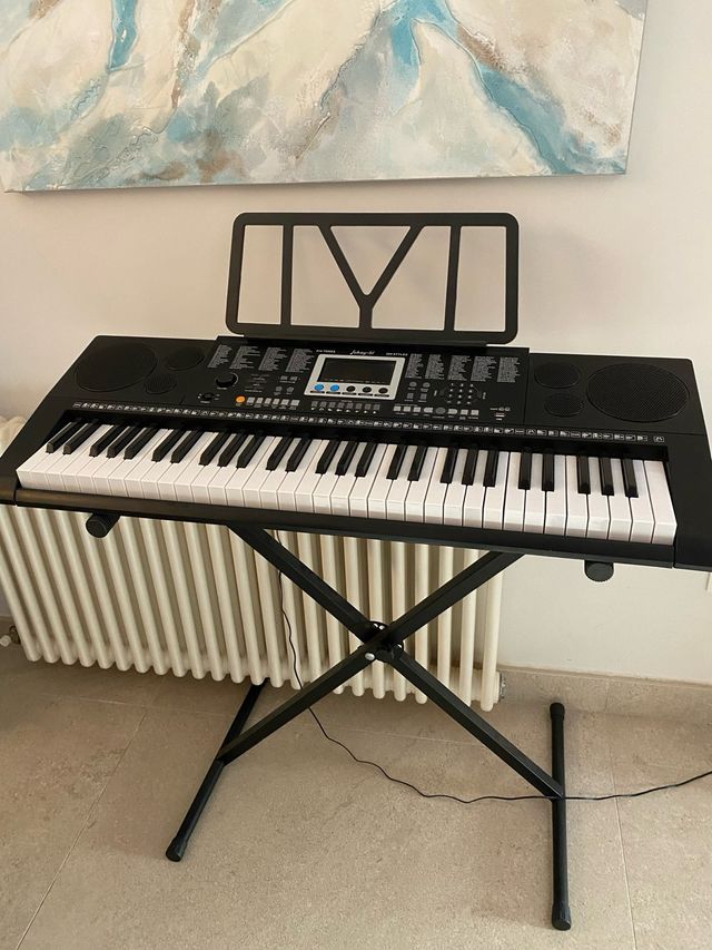 Teclado electrónico con soporte