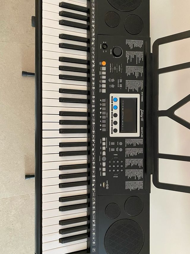 Teclado electrónico con soporte