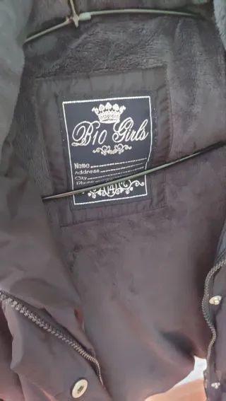 Chaquetón plumas azul marino.Marca del corte ingle