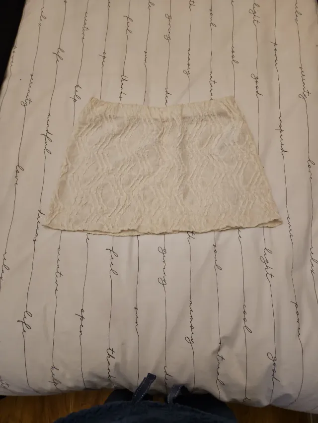 Falda mini beige con textura