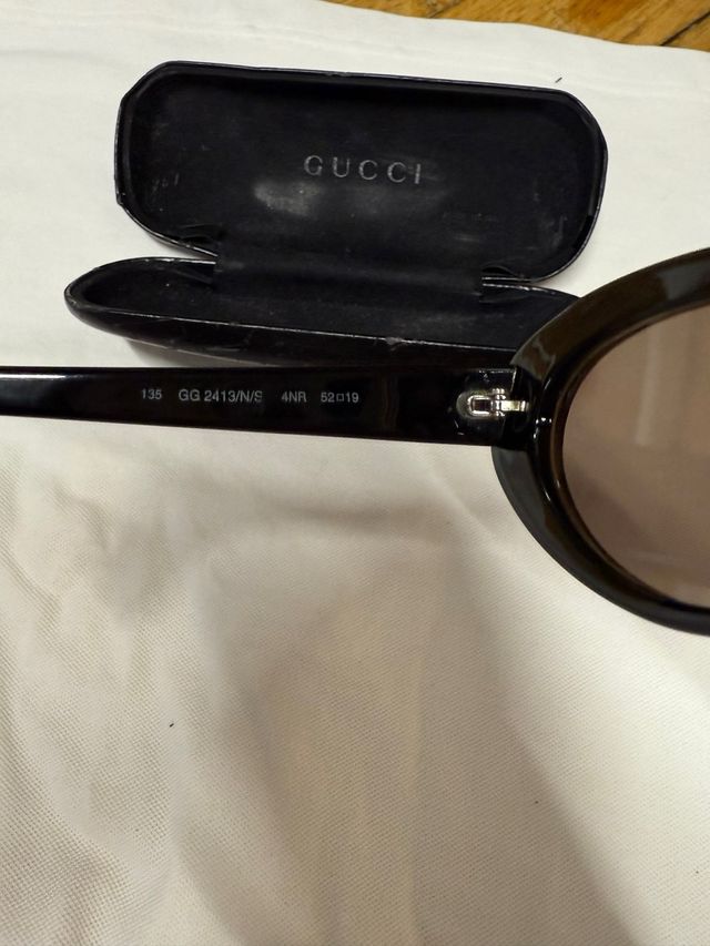 Gafas de sol Gucci marrones y doradas