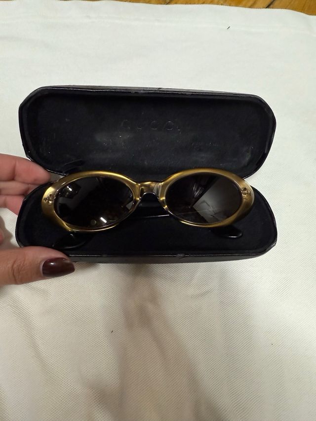 Gafas de sol Gucci marrones y doradas