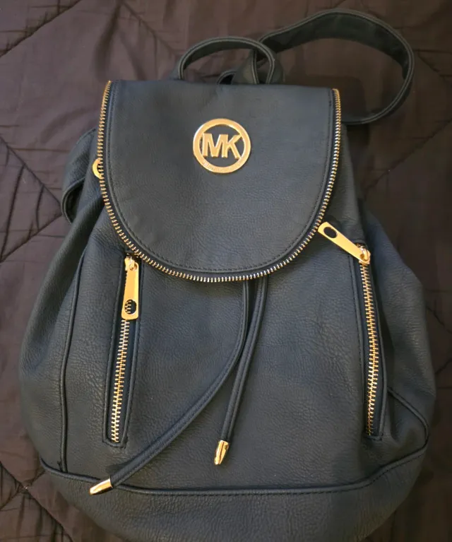 Mochila Michael Kors Negra y Dorada