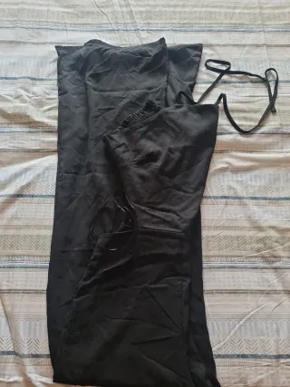 Mono negro con tirantes