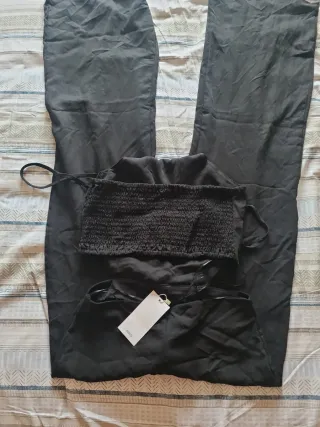 Mono negro con tirantes