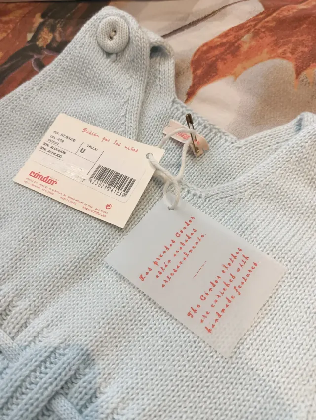 Saco bebé Condor azul tejido.