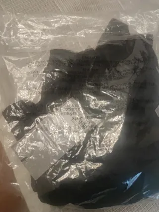 Pantalón técnico New Balance negro