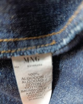 Chaqueta tejana corta bordada flor