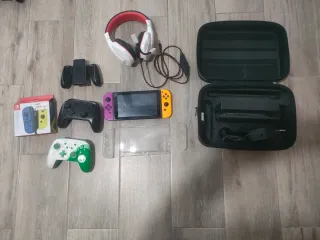 Nintendo Switch Viola/Giallo + Accessori
