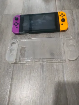 Nintendo Switch Viola/Giallo + Accessori