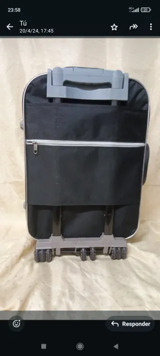 Maleta de viaje negra con ruedas