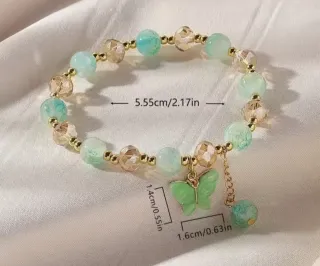 Pulsera elástica con cuentas de mariposa y detalle