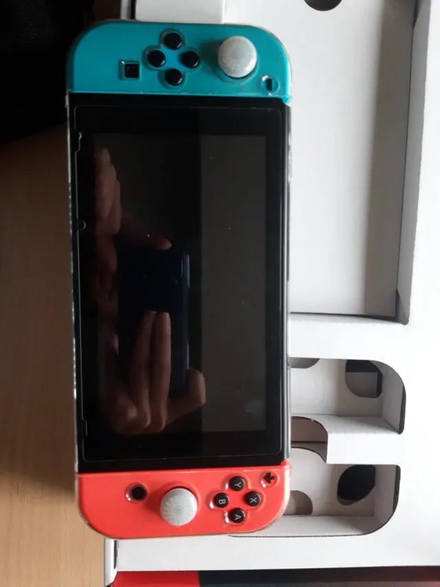 Nintendo Switch + Juego y accesorios